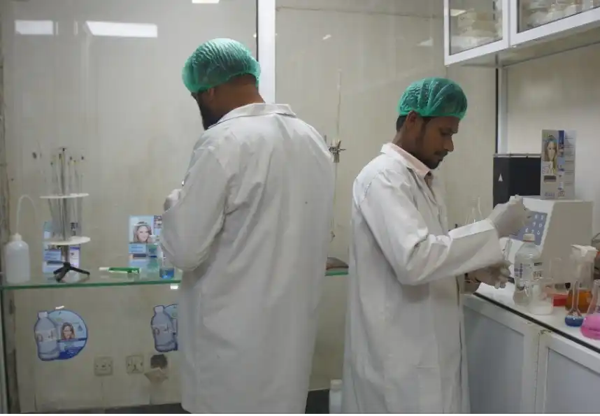Lab Staff Of Organic Drinking Water